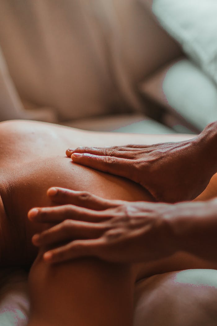 services-02 A soothing back massage session in a spa setting, focusing on wellness and relaxation.