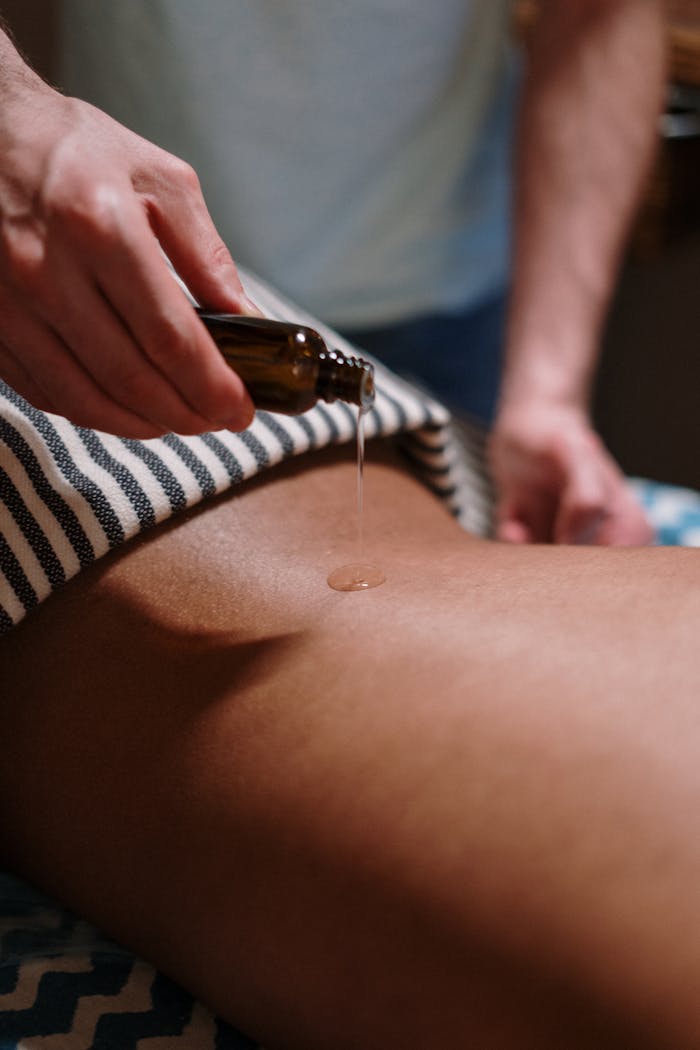 services-02 Experience tranquility with a soothing oil massage in a serene spa environment.